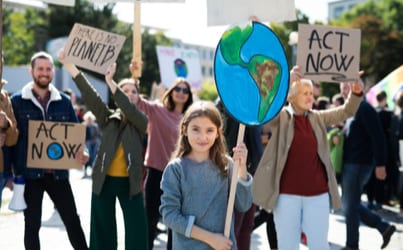 Girl holding earth sign