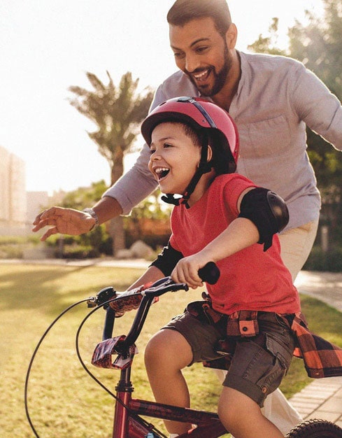 Little Boy Learning to Ride Bicycle